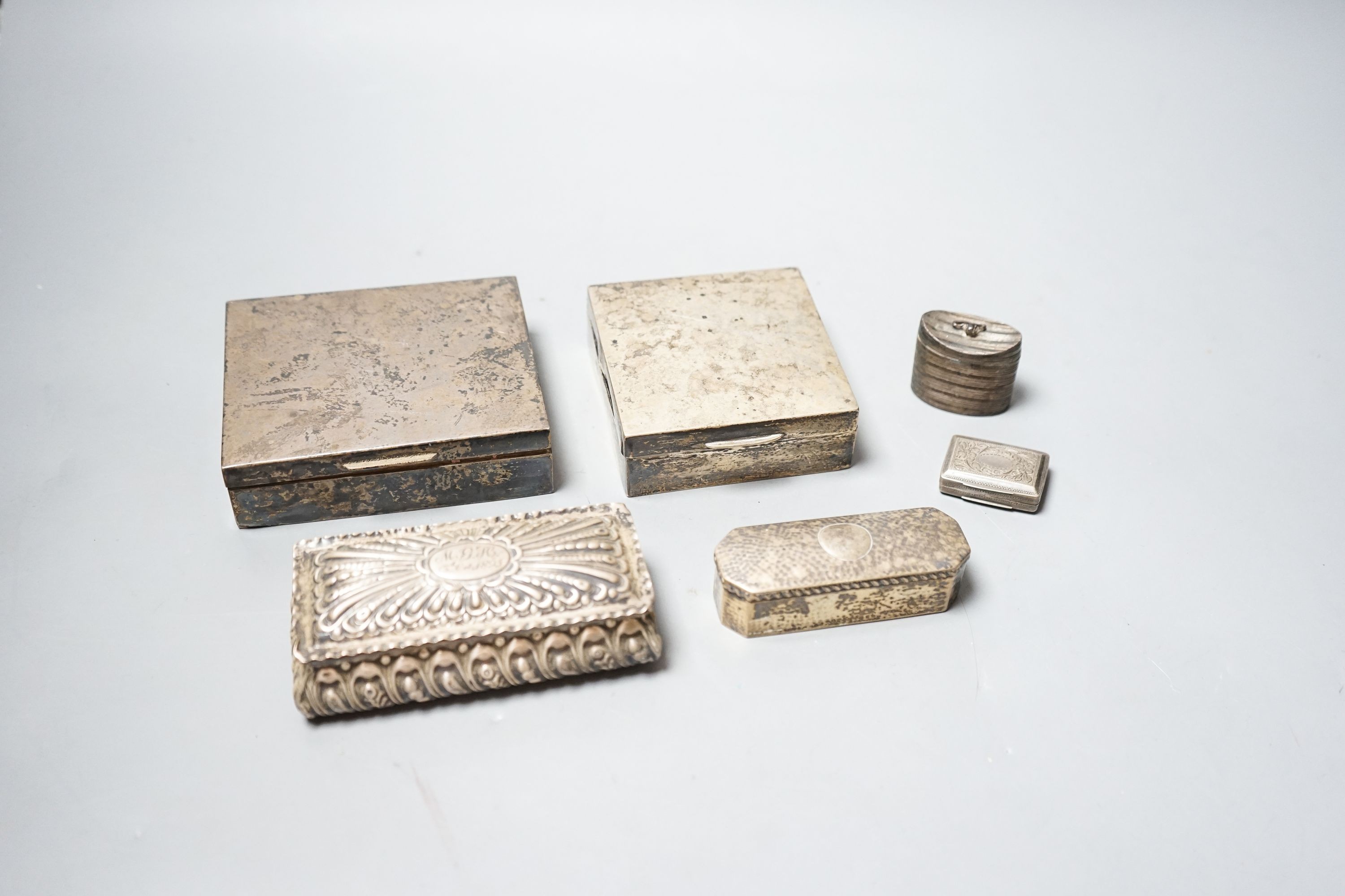 A George IV silver vinaigrette (lacking grille), Birmingham, 1825, 33mm, a Dutch white metal snuff box, and four other silver boxes.